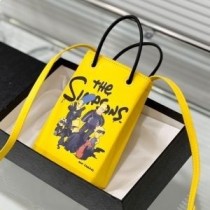 Nákupní držák telefonu Balenciaga v žluté kůži s potiskem Simpsons