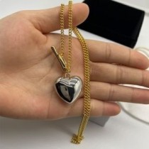 Balenciaga – Halskette mit Herzanhänger in Gold/Silber