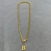 Balenciaga – Goldfarbene Halskette mit B-Anhänger und Kristallen