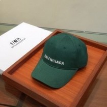 Balenciaga – Kappe aus Baumwolle mit Logostickerei in Grün/Weiß
