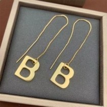 Orecchini pendenti Balenciaga B in oro