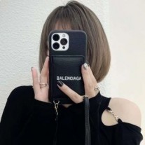 Balenciaga Cash iPhone-etui med kortholder og rem i kornet kalveskind