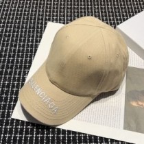 Pamučna kapa Balenciaga s izvezenim logotipom u bež/bijeloj boji