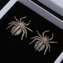 Zlatne naušnice Balenciaga Spider Kristali