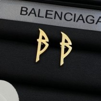 Balenciaga Typo kovové náušnice v zlate