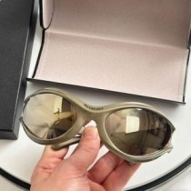 Okrągłe okulary przeciwsłoneczne Balenciaga BB0317S z dynamem w kolorze khaki
