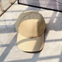 Balenciaga Gorra con logo bordado en algodón en beis