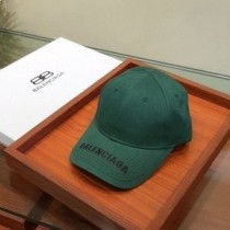 Balenciaga Casquette brodée en coton avec logo en vert/noir
