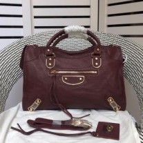 Balenciaga Middelgrote klassieke stadsschoudertas in bordeauxrood geitenleer met metallic randen