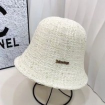 Balenciaga gebreide vissershoed in beige
